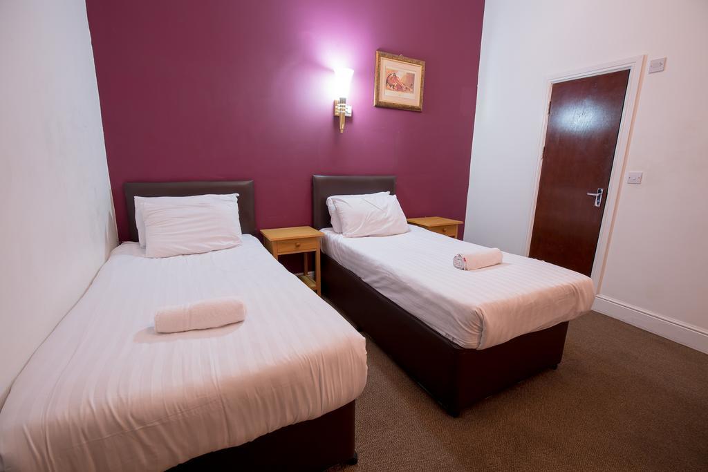 Citybest Hotel Ilford Szoba fotó